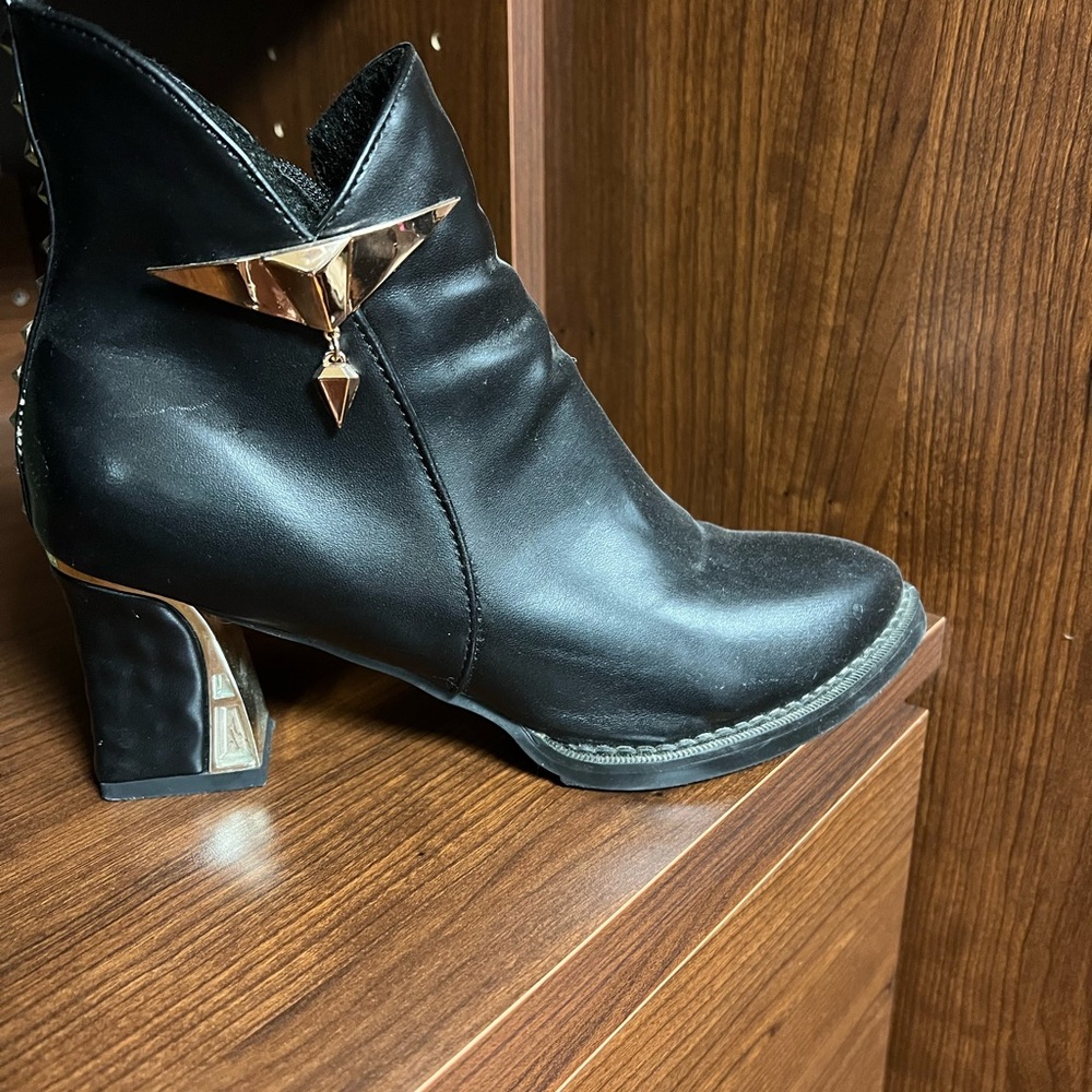 Elegant Black Ankle Boots with Gold Accent